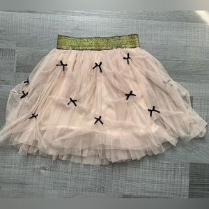 Beige tulle skirt with black bows